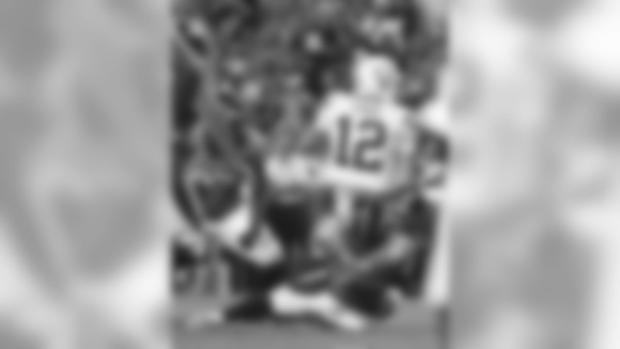 DE DeMarcus Ware and Colts QB Andrew Luck