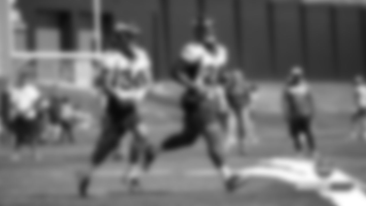 Phillip Lindsay and Royce Freeman during practice on Day 2 of training camp on July 19, 2019.