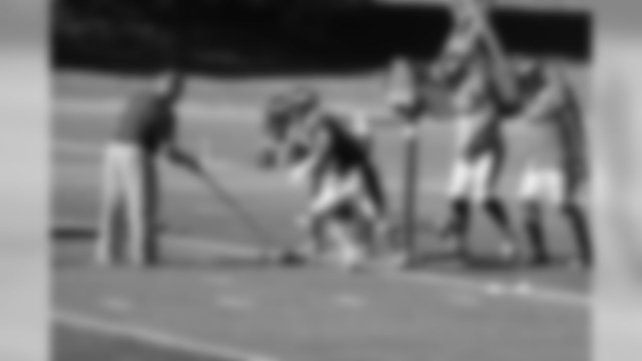 Vickerson and DE Derek Wolfe work on getting off the line at the snap.