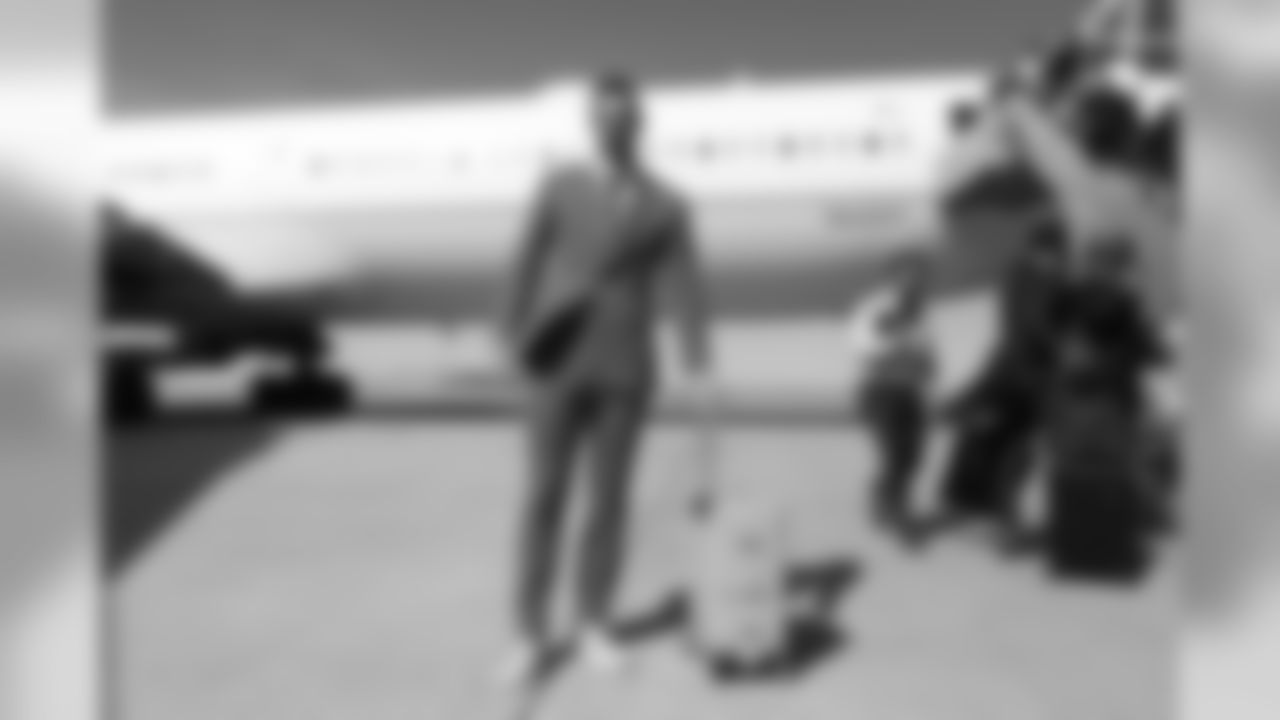 Brandon McManus on the tarmac at Denver International Airport during the team's travel to California on October 5, 2019 ahead of their Week 5 game against the Los Angeles Chargers. (Photo by Ben Swanson)