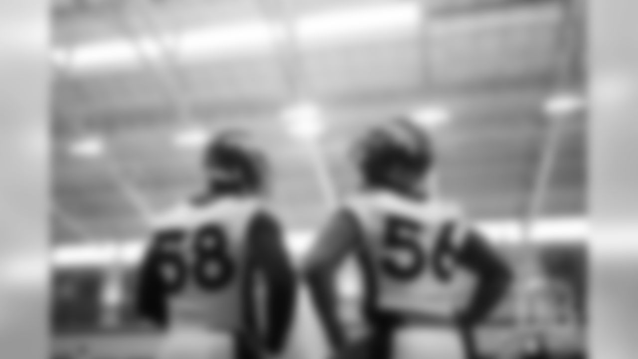 Von Miller and Dekoda Watson during the first practice of mandatory minicamp on June 4, 2019.