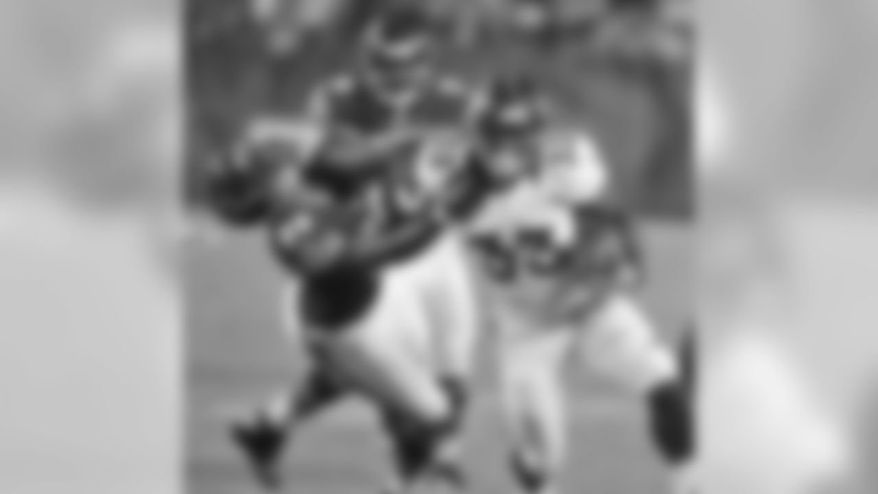 Omon with a mean stiff arm.