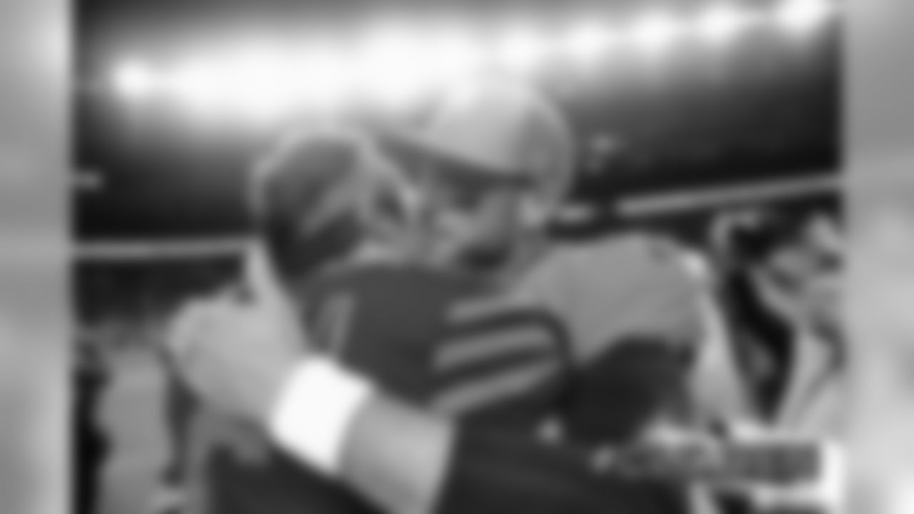 Denver Broncos quarterback Brandon Allen (2) and Cleveland Browns quarterback Baker Mayfield (6) greet one another postgame at midfield of the NFL game against the Cleveland Browns in Denver, Sunday, Nov. 3, 2019. (Photo: © Eric Lars Bakke)