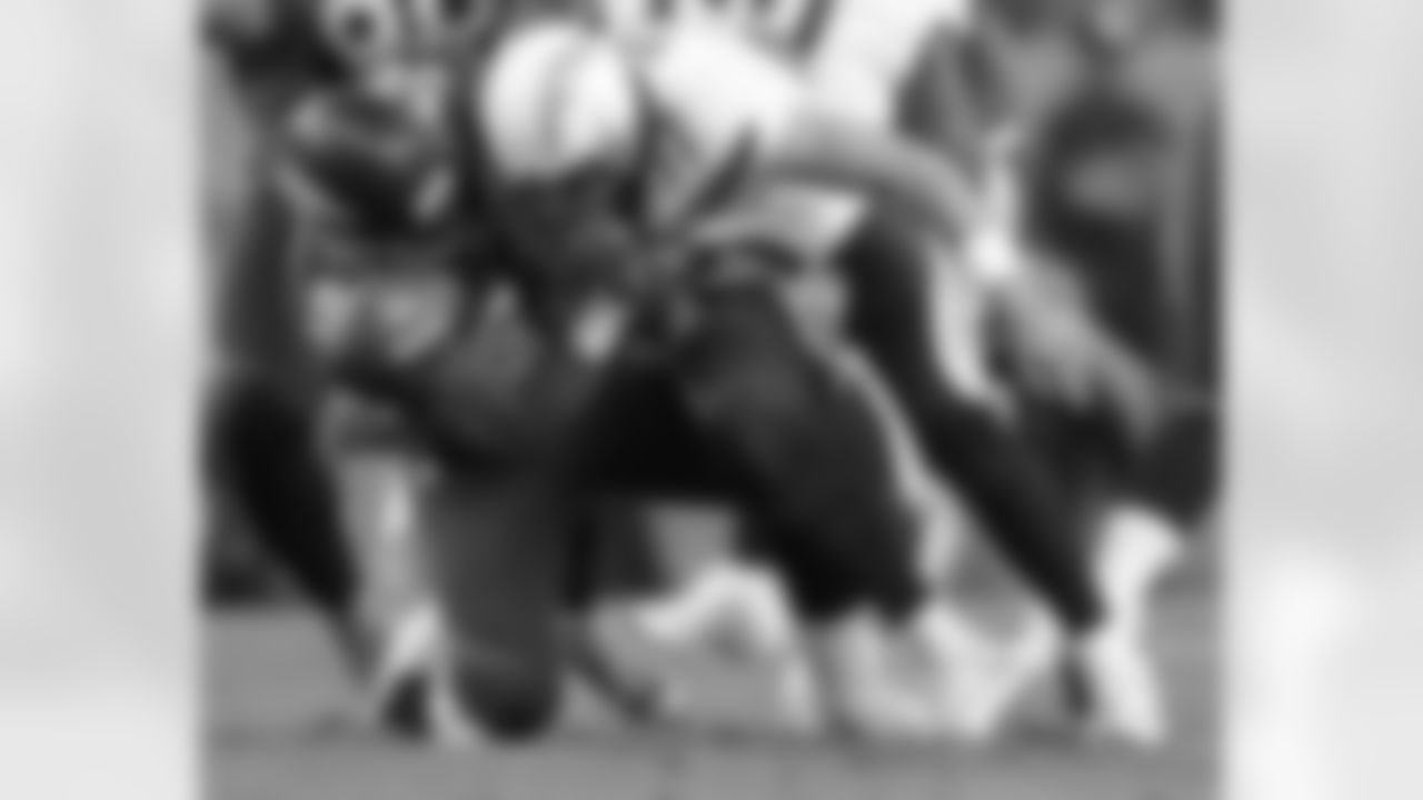 Miller strip-sacks Rivers.