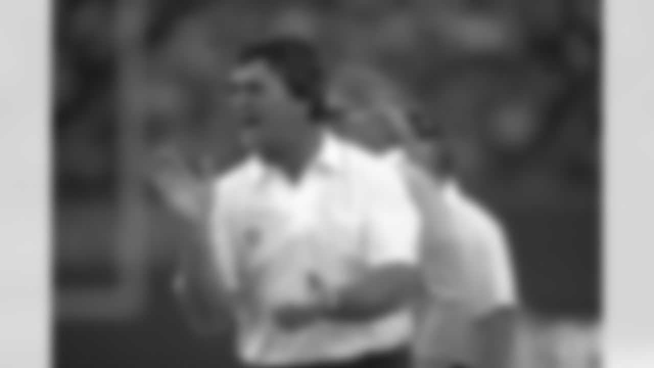Dan Reeves coaches from the sideline during a 1983 game in Seattle.