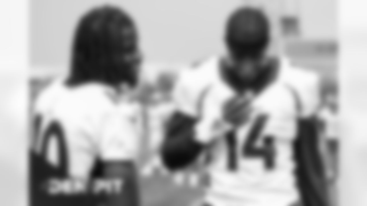 Courtland Sutton and Jerry Jeudy smile as they talk during practice at UCHealth Training Center on September 18, 2020. (Photo by Ben Swanson)