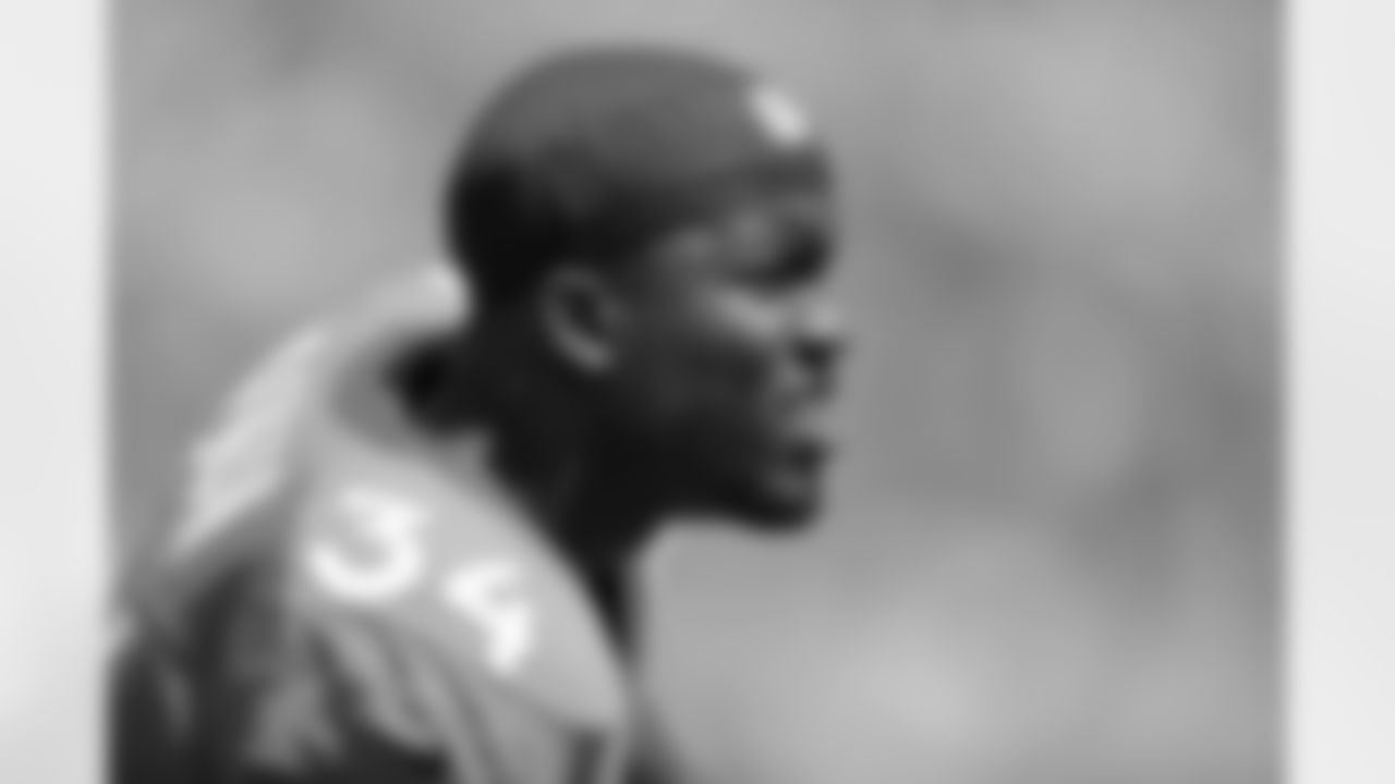 Running back Ronnie Hillman looks on during first half action.