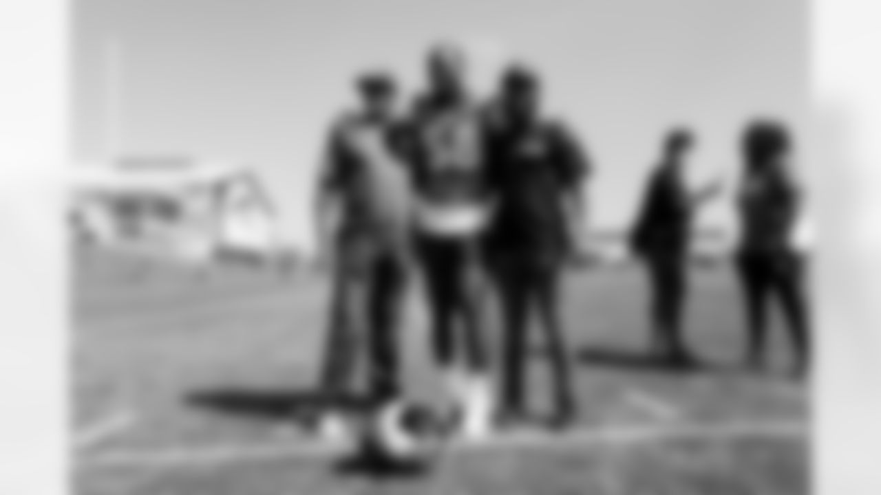 Von Miller with his father and brother after practice on Day 17 of training camp at UCHealth Training Center on August 19, 2021. (Photo by Ben Swanson)