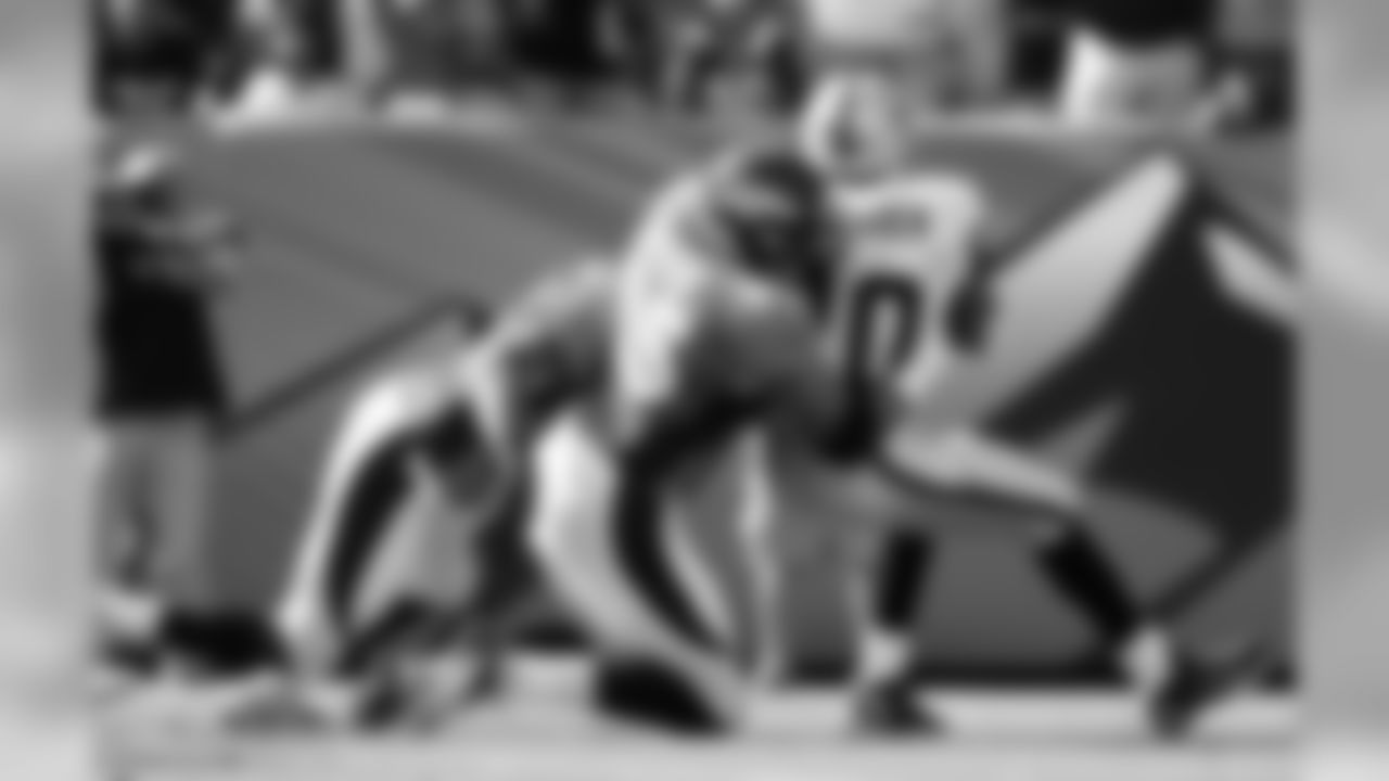 DE Derek Wolfe stops Oakland RB Darren McFadden in his tracks.