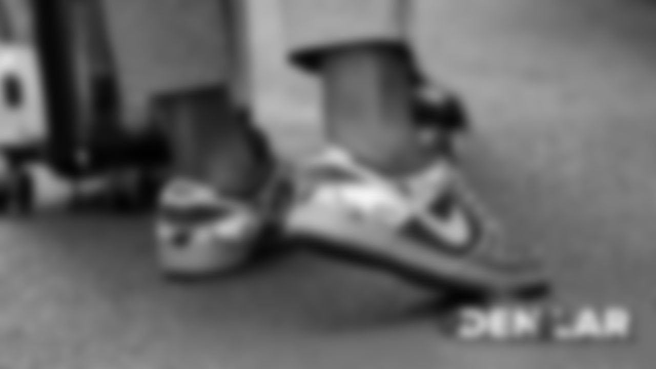 Zach Kerr's De La Soul sneakers during the walk to the team buses for the Broncos' travel to Los Angeles on August 23, 2019 ahead of their game against the Rams. (Photo by Ben Swanson)