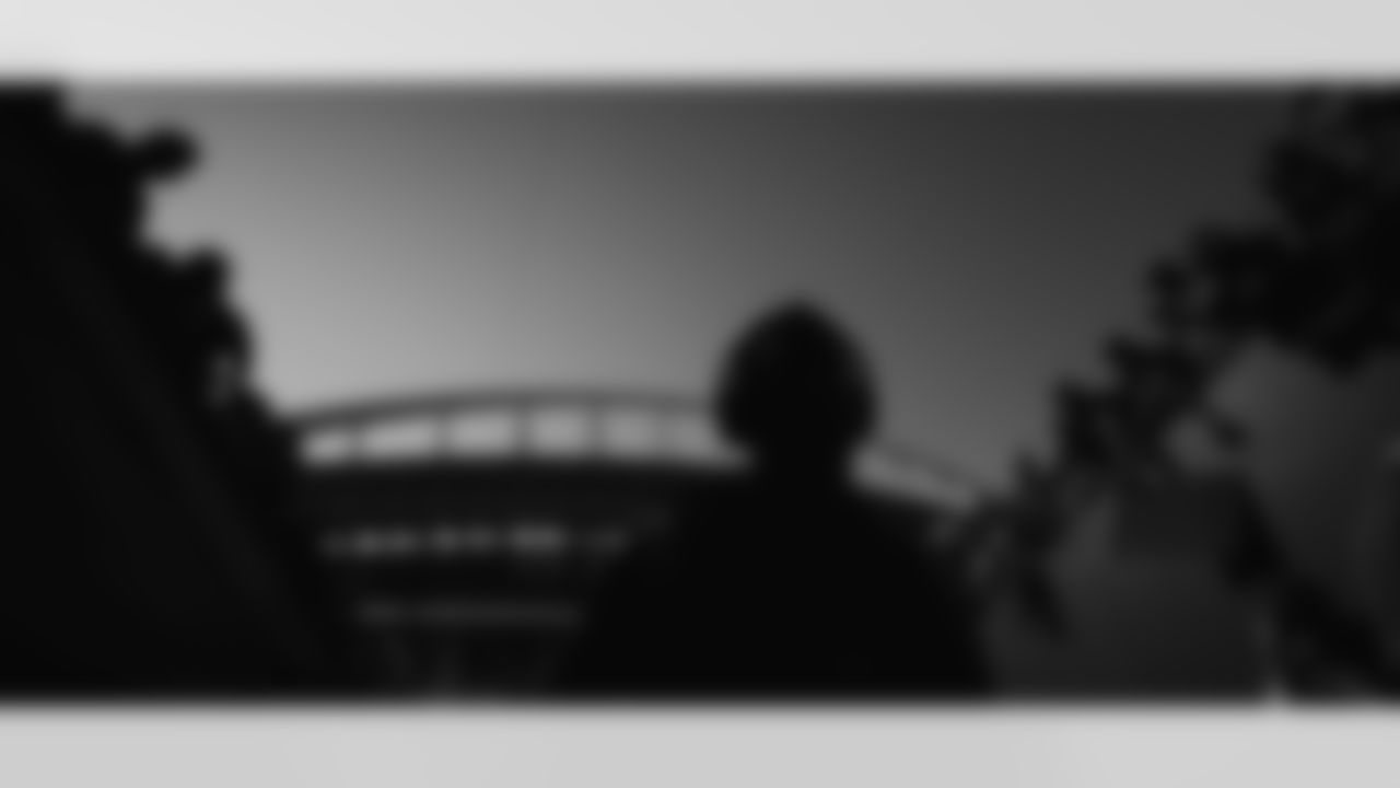 Russell Wilson in silhouette during pregame warmups before the Broncos' Week 1 game against the Seattle Seahawks at Lumen Field in Seattle, Washington on September 12, 2022. (Photo by Ben Swanson)