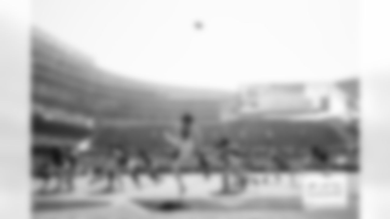 Denver Broncos punter Riley Dixon (9) punts the ball from inside the end zone during the Broncos' Week 4 game against the Chicago Bears at Soldier Field in Chicago, Illinois on October 1, 2023. Photo by Gabriel Christus / Denver Broncos