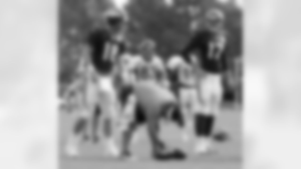 Welker watches as Manning gets set to take a snap.