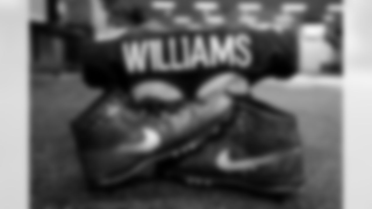 DeShawn Williams's jersey and cleats in the locker room before the Broncos' Week 6 game against the Las Vegas Raiders at Empower Field at Mile High in Denver, Colorado on October 17, 2021. (Photo by Sam Weaver)