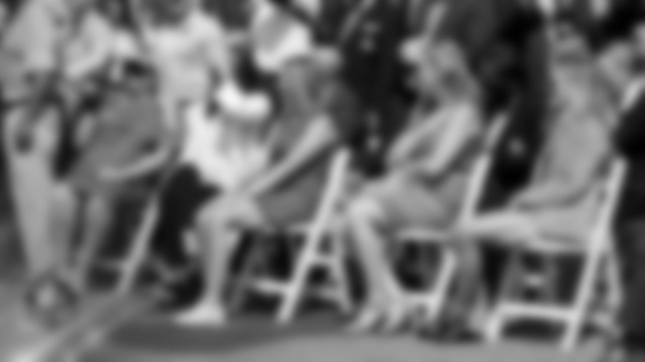 The Bowlen family watches during the Pro Football Hall of Fame group photo in Canton, Ohio, August 2, 2019.
