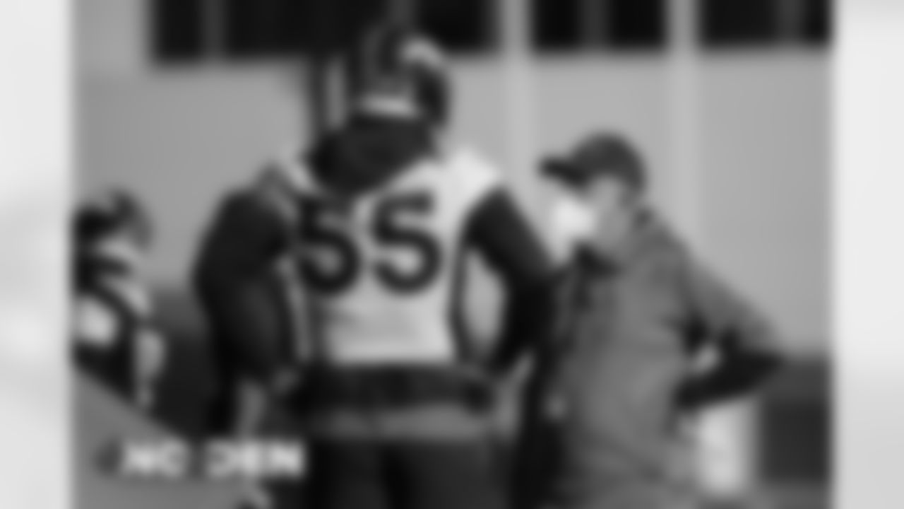 Bradley Chubb talks with Head Coach Vic Fangio at practice at UCHealth Training Center on November 28, 2020. (Photo by Ben Swanson)