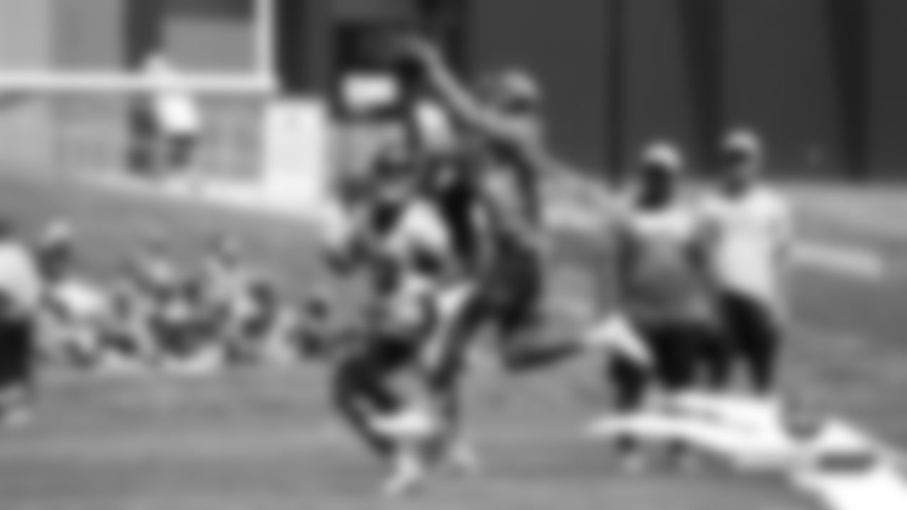 De'Vante Bausby intercepts a pass during practice on Day 2 of training camp on July 19, 2019.