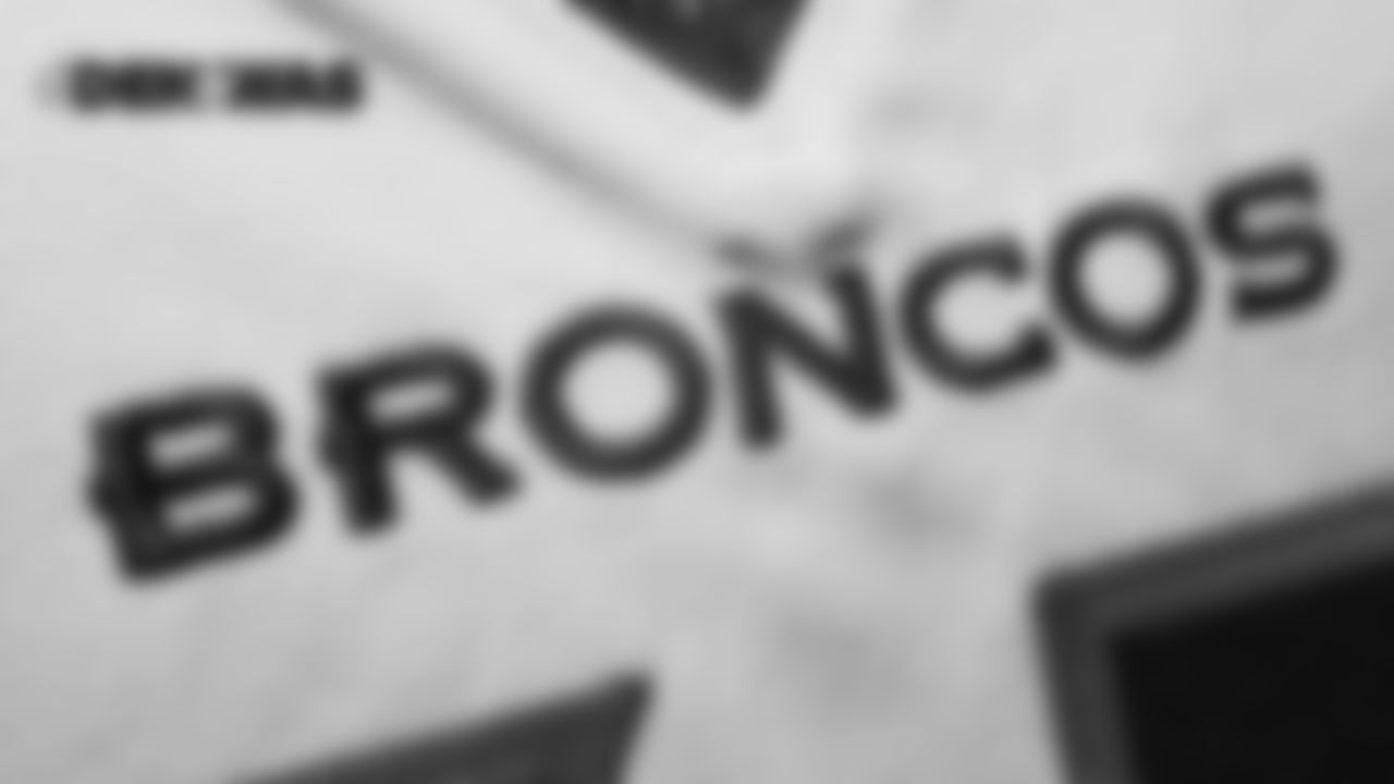 The Broncos logotype on the front of a jersey in the locker room pregame before the Broncos' preseason game against the Washington Redskins at FedExField on August 24, 2018.