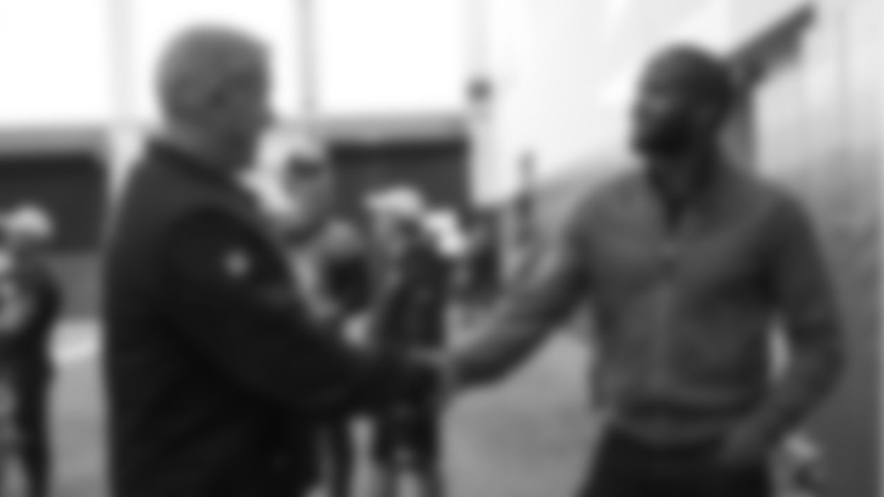 President of Football Operations/General Manager John Elway talks with Pro Football Hall of Fame and Broncos Ring of Fame cornerback Champ Bailey at practice on October 11, 2019 at UCHealth Training Center. (Photo by Ben Swanson)