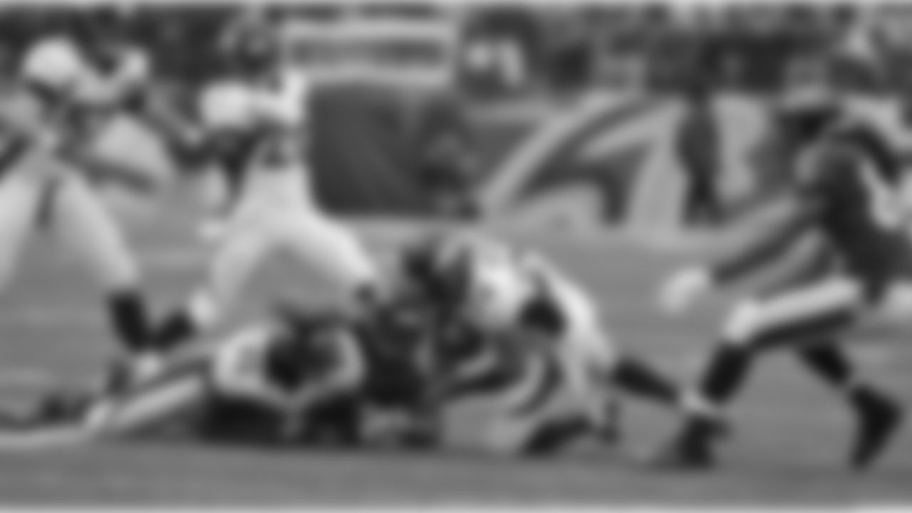 S Rahim Moore pounces on the loose ball after DT Justin Bannan knocked it loose from Joe Flacco.