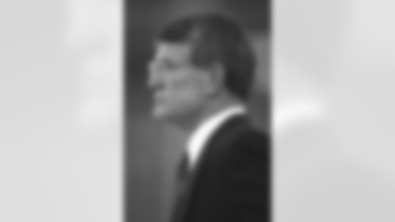 Coach Dan Reeves watches from the sideline during a 1990 game.