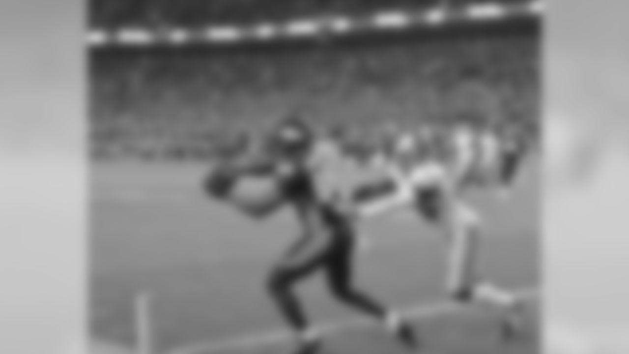 Thomas dragged his toes perfectly after snagging the pass on his way out of bounds.