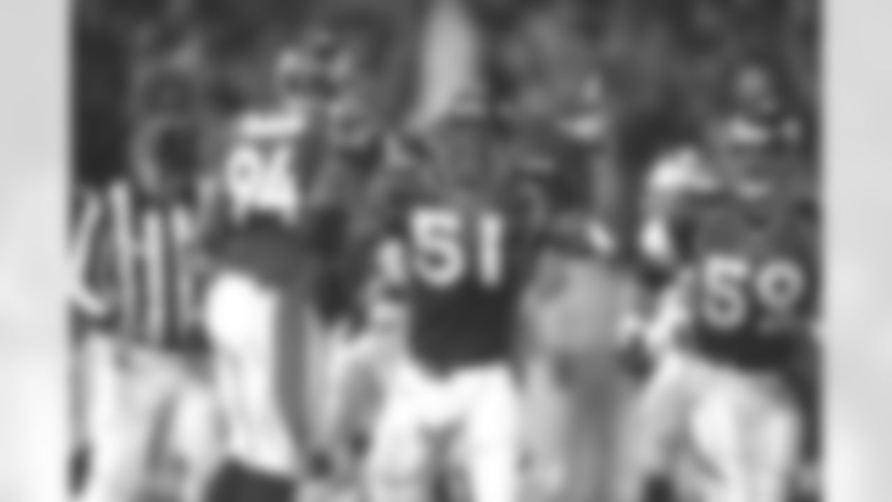 John Mobley celebrates after making a great defensive stand against the Oakland Raiders at Mile High Stadium in Denver, CO on November 24, 1997.