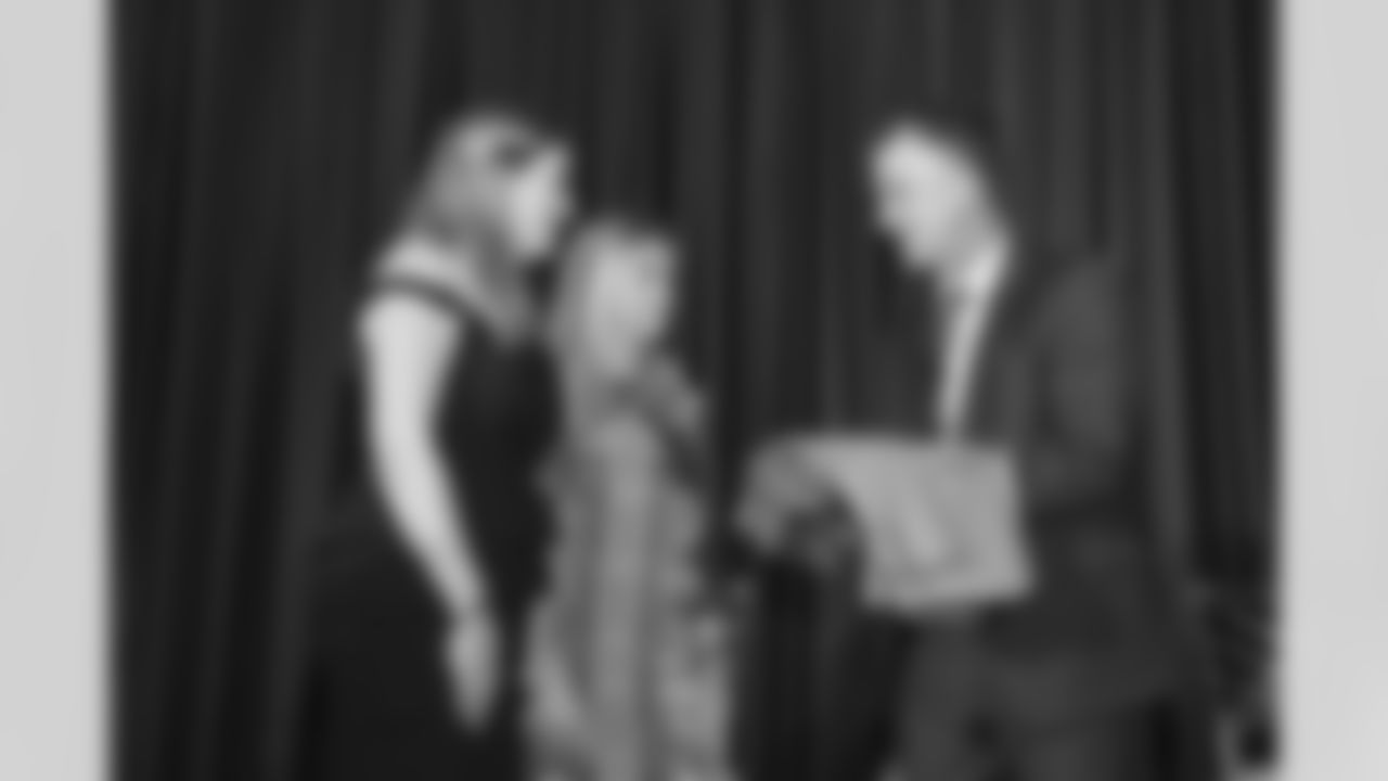 Brittany Bowlen, Anabel Bowlen present Goose Gonsoulin's jacket during the Ring of Fame Banquet on Friday, October 15, 2021 at Empower Field at Mile High in Denver, Colorado.
Photo by Gabriel Christus