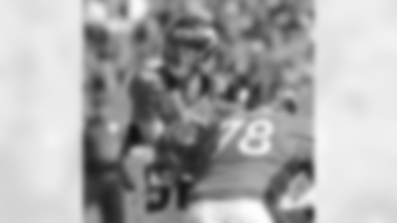 QB Peyton Manning fires a pass during the first half against the Oakland Raiders.