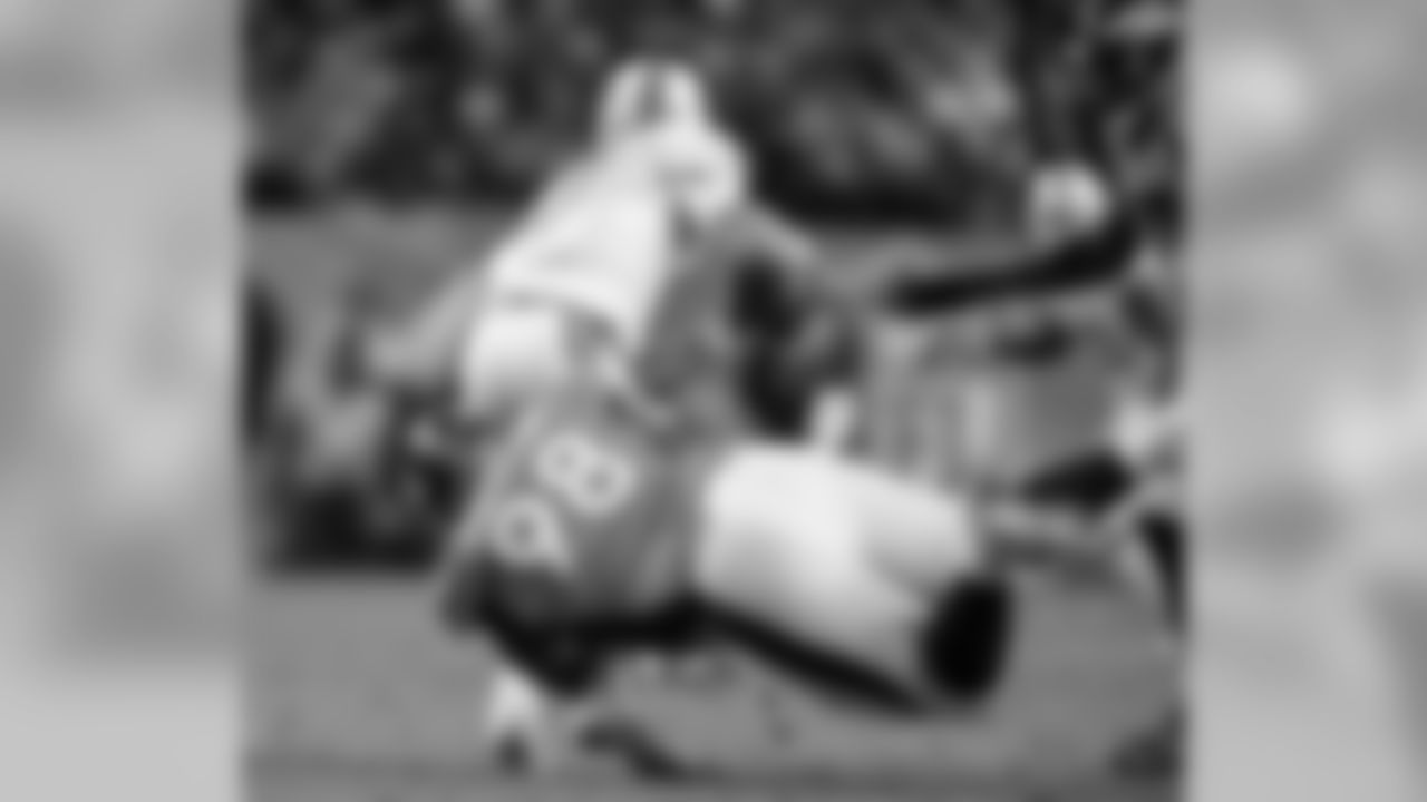 Defensive tackle Terrance Knighton busts through the Dolphins offensive line for a sack on Ryan Tannehill.