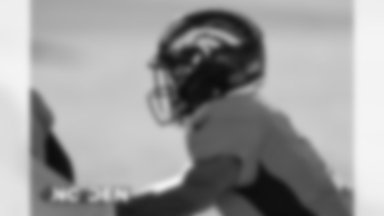Kendall Hinton warms up before the Broncos' Week 12 game against the New Orleans Saints at Empower Field at Mile High on November 29, 2020. (Photo by Eric Lars Bakke)
