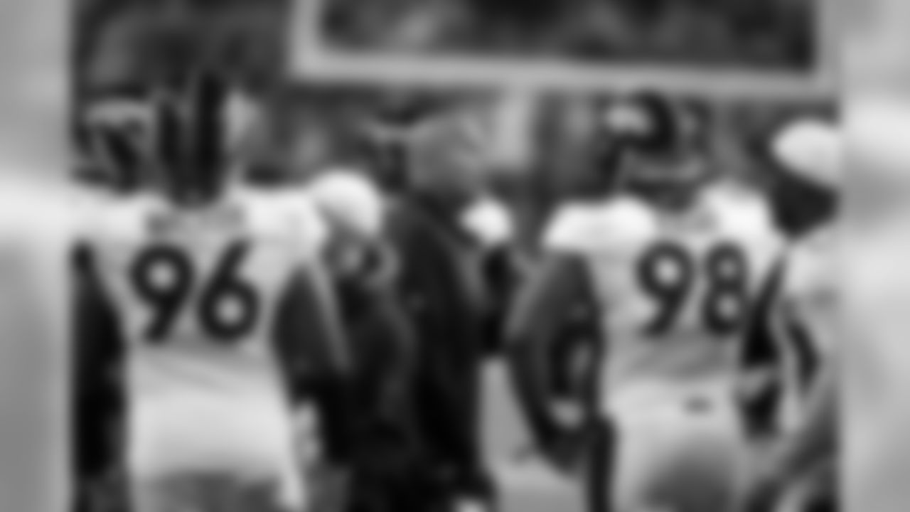 Defensive Line Coach Bill Kollar talked to his group of linemen during the game against Seattle.