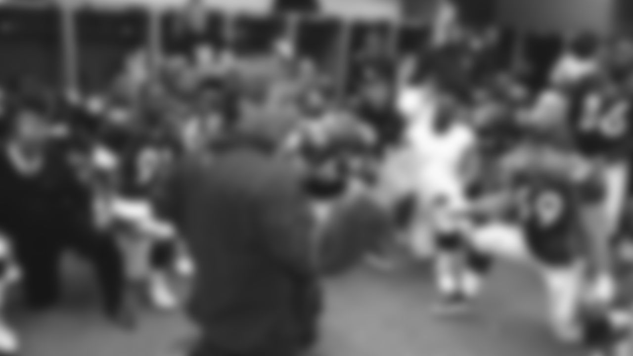 Mike Shanahan talks to the team after the Broncos' 42-17 win over the Jacksonville Jaguars in the Wild Card round of the 1997 playoffs on December 27, 1997 at Mile High Stadium.