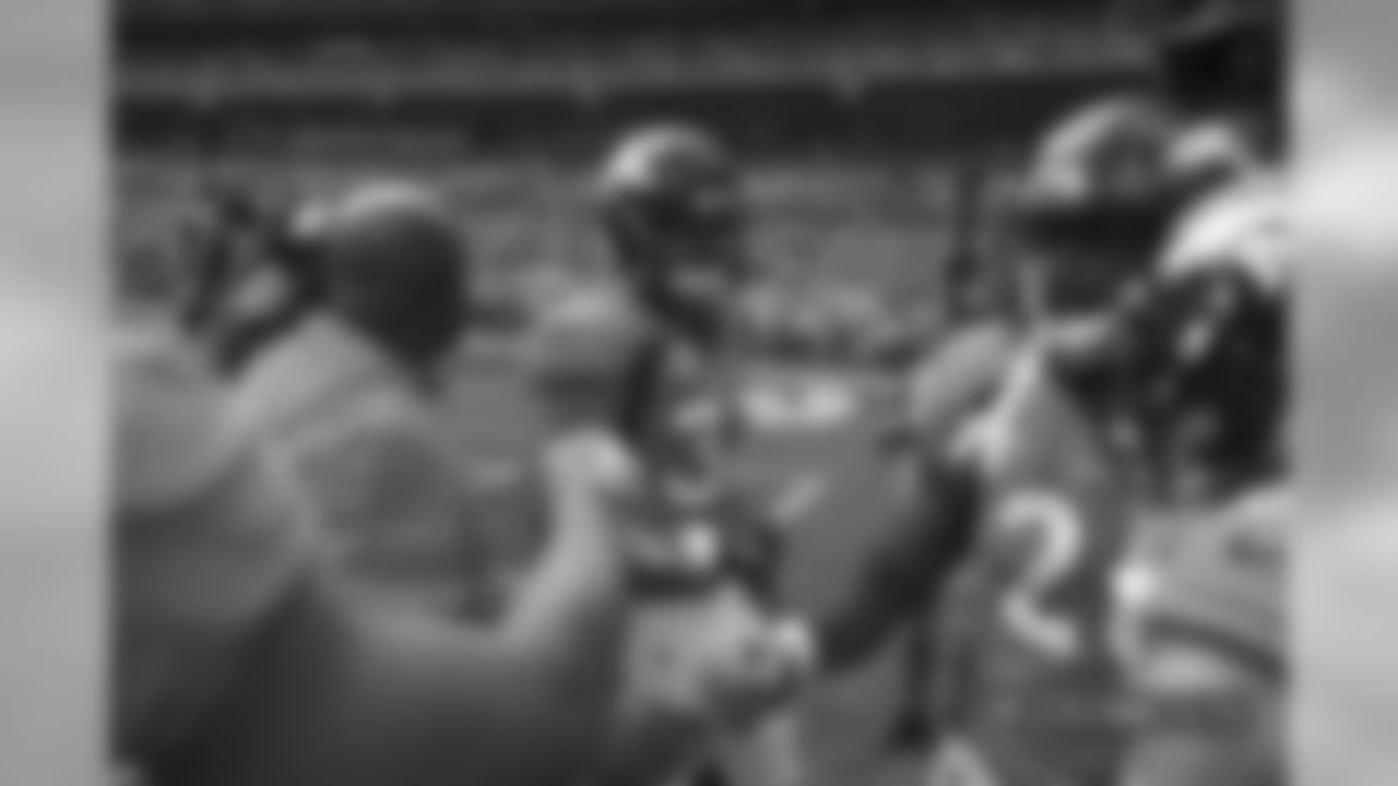 Running backs in pre-game warmups before an NFL game against the Oakland Raiders, Sunday, Sep. 16, 2018, in Denver. (Photo: Eric Lars Bakke)