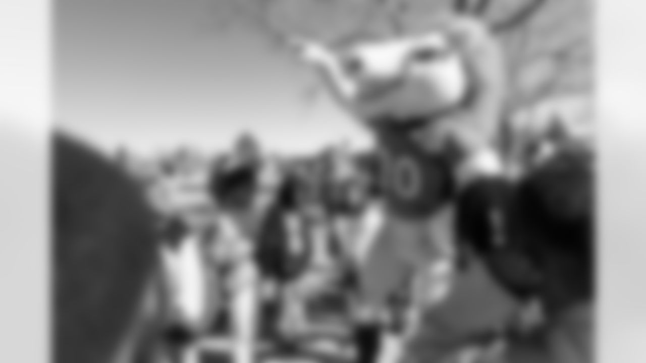 Miles the mascot during an event as part of Random Acts of Kindness Week at Jewell Elementary School in Aurora, Colorado on February 13, 2023. Photo credit: Ben Swanson/DenverBroncos.com