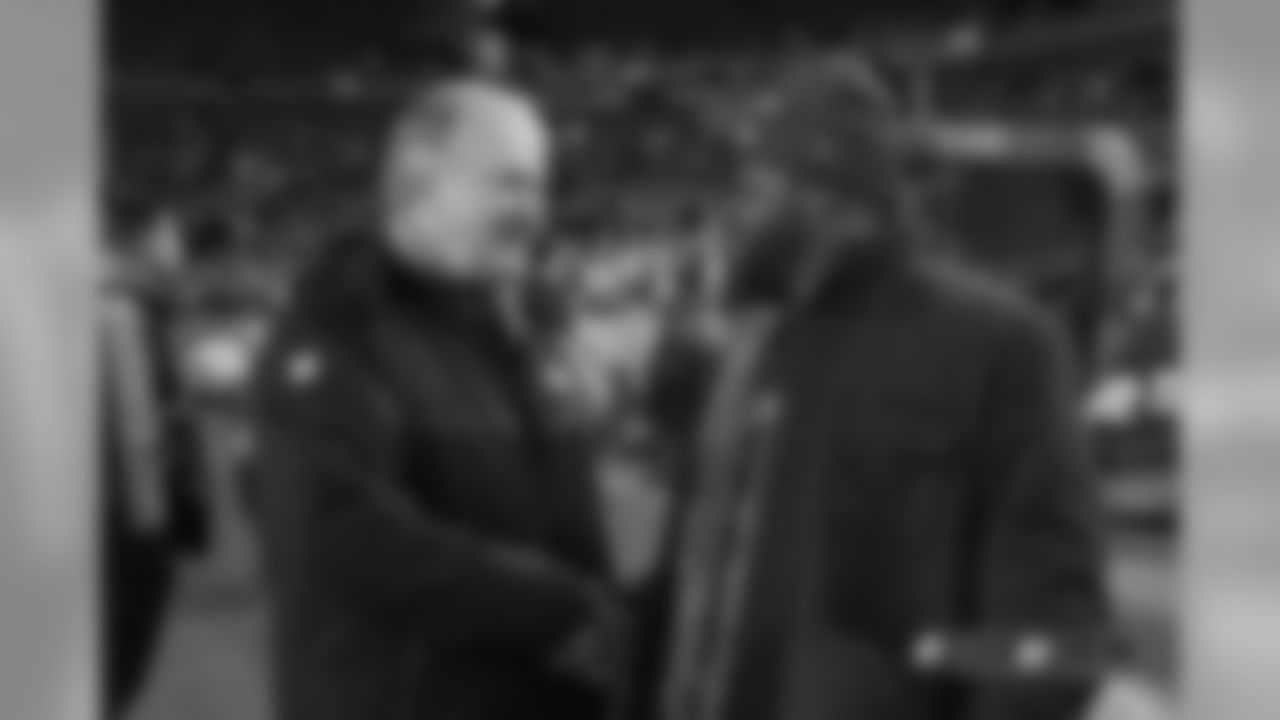 President and CEO Joe Ellis greets former Broncos linebacker Al Wilson before the Broncos' Week 15 game against the Browns.