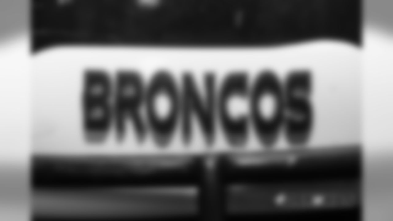 The Broncos logotype on a helmet in the locker room pregame before the Broncos' preseason game against the Washington Redskins at FedExField on August 24, 2018.