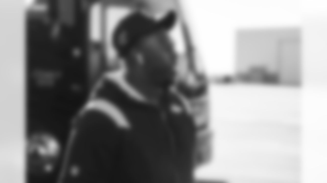 DeShawn Williams on the tarmac at Denver International Airport on December 4, 2021 during the team's travel to Kansas City in Week 13. (Photo by Joe Abdellah)