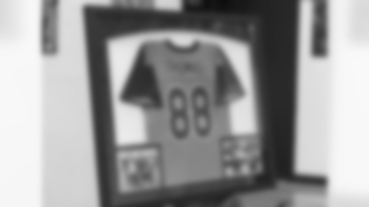 A view of the framed jersey that was retired in Demaryius Thomas' memory by Emmanuel Sanders, who donated new jerseys, at the Denver Broncos Boys & Girls Club in Denver, Colorado on May 4, 2022. (Photo by Pete Eklund)