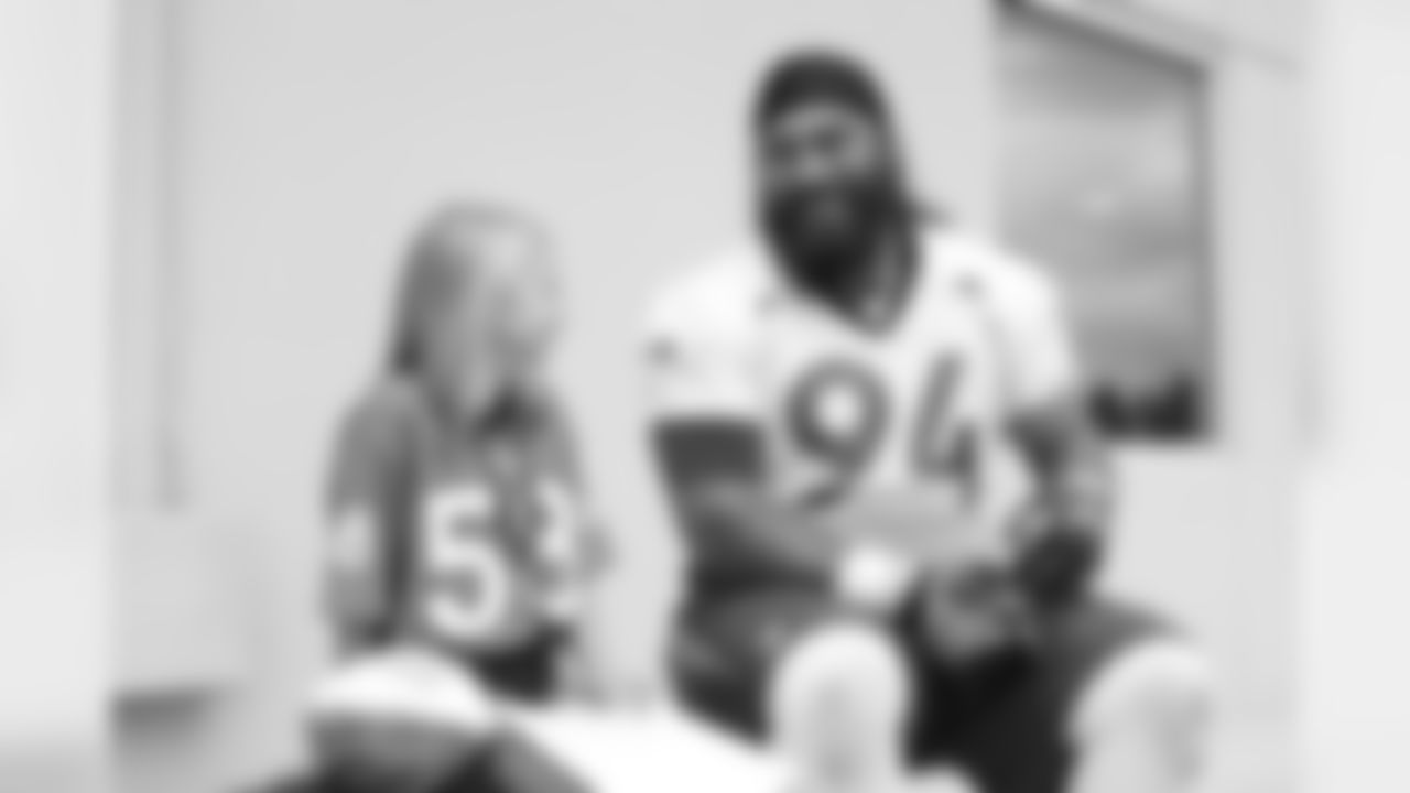 Children's Hospital Colorado junior reporter Kaylea interviews Domata Peko Sr. after practice on September 5, 2018 at UCHealth Training Center.