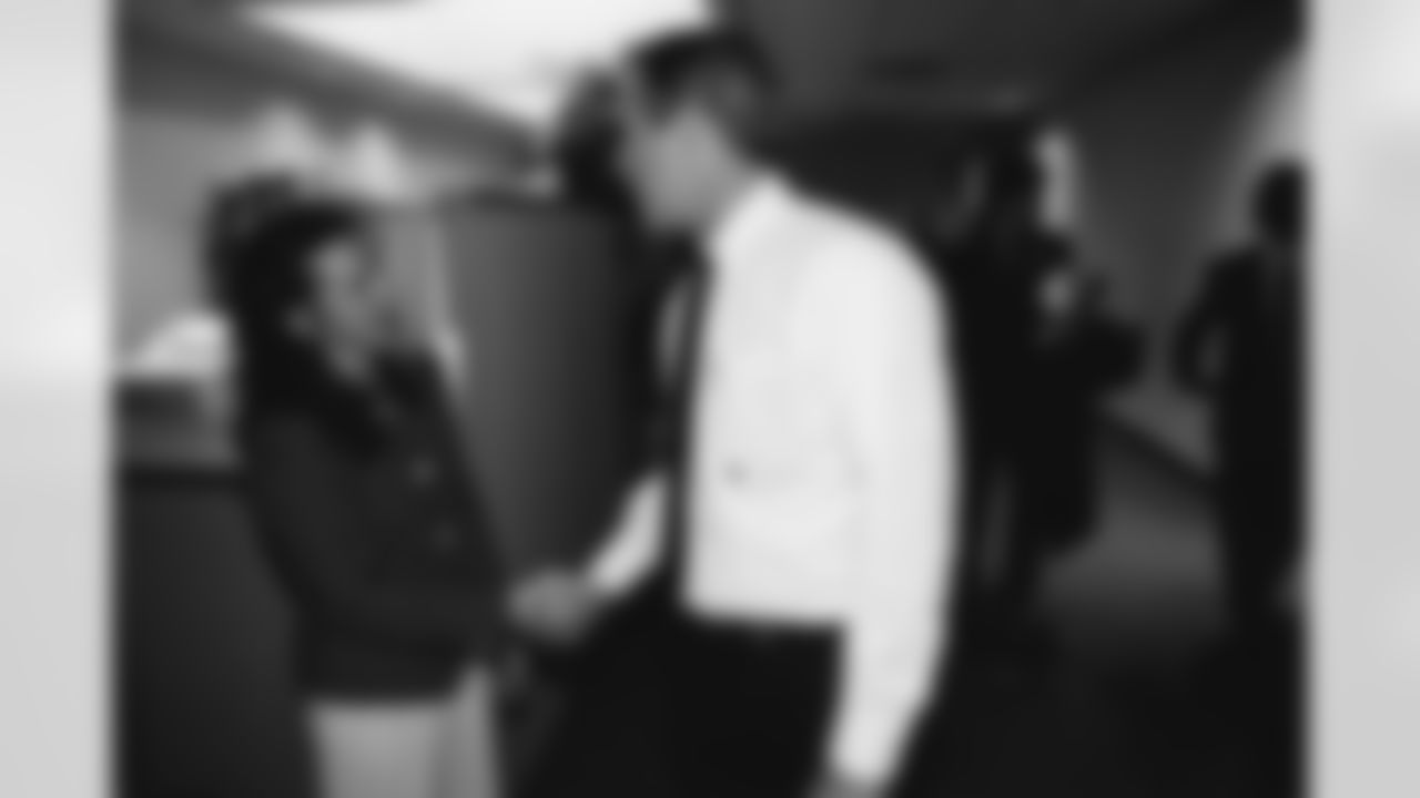 Lisa Williams, Executive Asst. to President & CEO and General Counsel, greets George W. Bush.