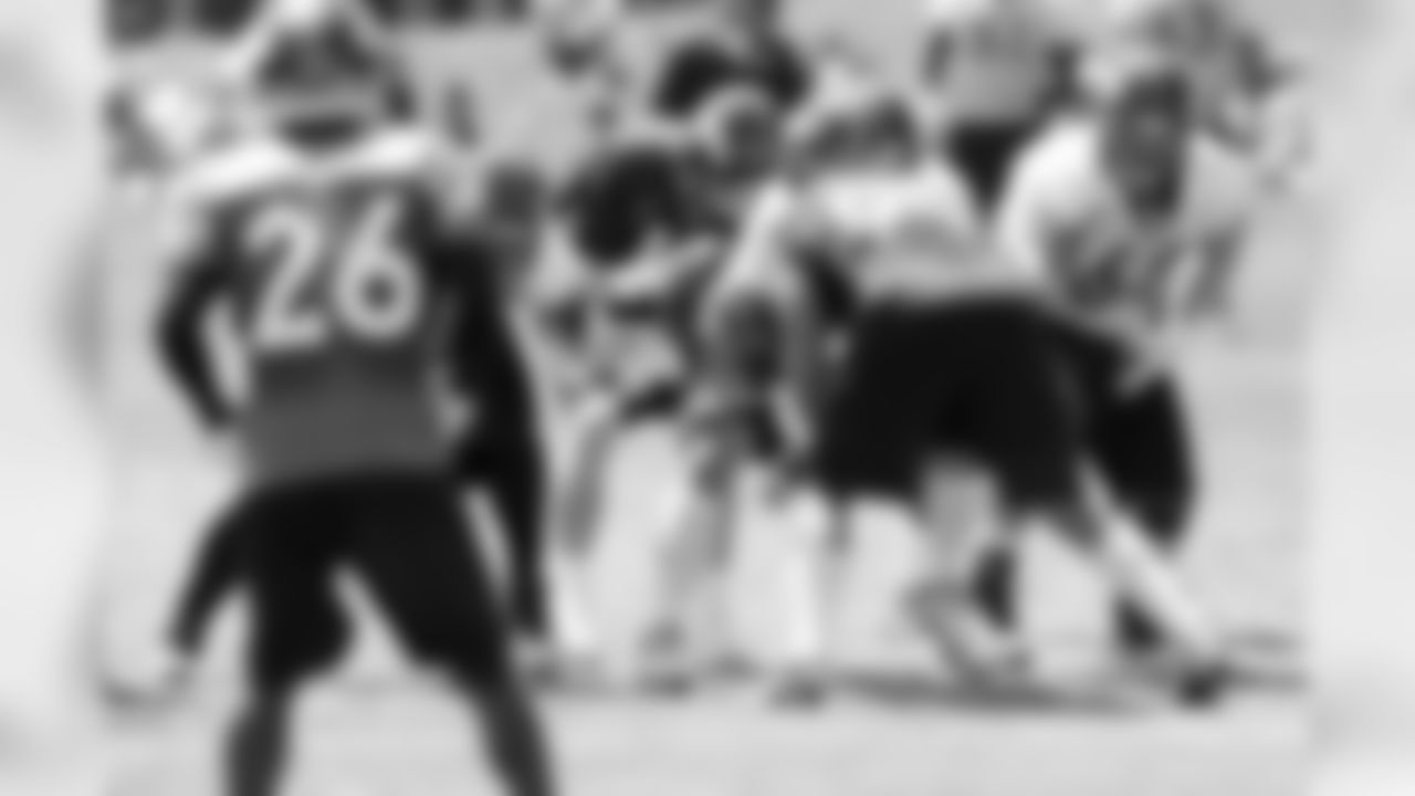 Manning spikes the ball to stop the clock during the two-minute drill.