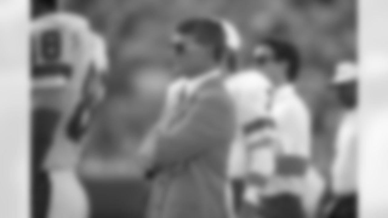 Coach Dan Reeves watches from the sideline during a December 1989 game.