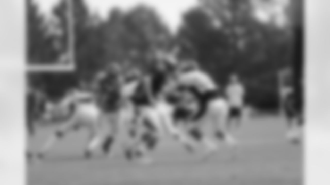 Zac Dysert fakes a handoff to Lance Ball.