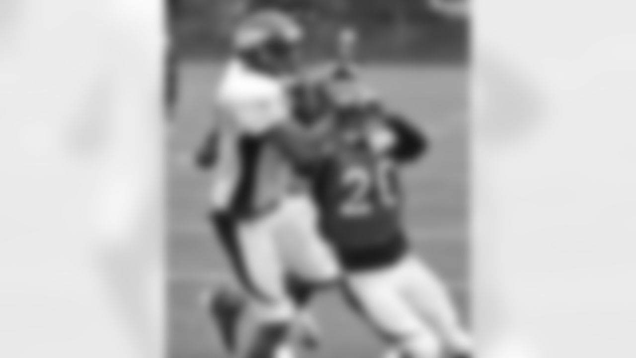 Caldwell makes a catch in front of Adams.