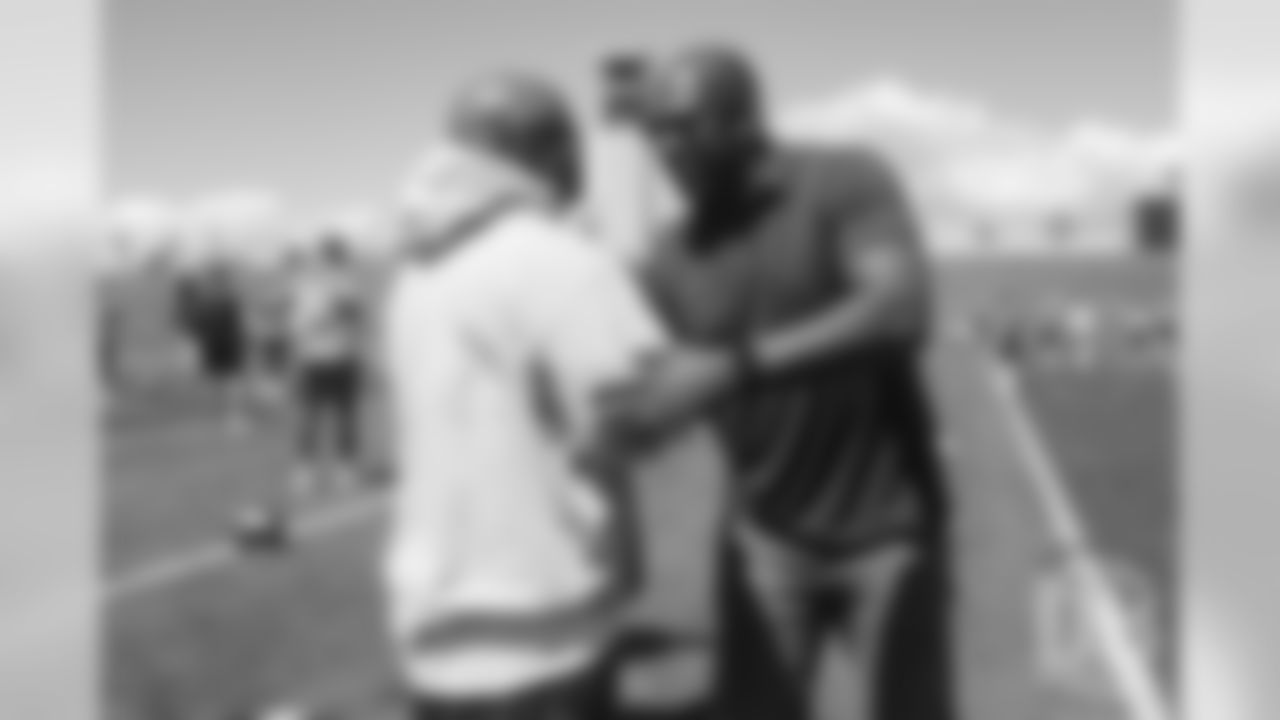 Running Backs Coach Curtis Modkins talks with University of Colorado head football coach Mel Tucker during the Broncos' practice on the ninth day of their OTAs on May 31, 2019. during the Broncos' practice on the ninth day of their OTAs on May 31, 2019.