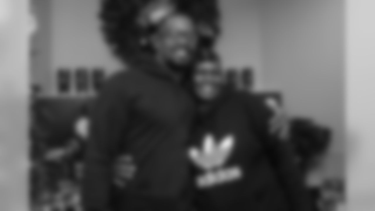 Von Miller takes a photo with his mother, Gloria, at a toy drive for Boys & Girls Clubs of Metro Denver for the holidays on December 23, 2019. (Photo by Ben Swanson)