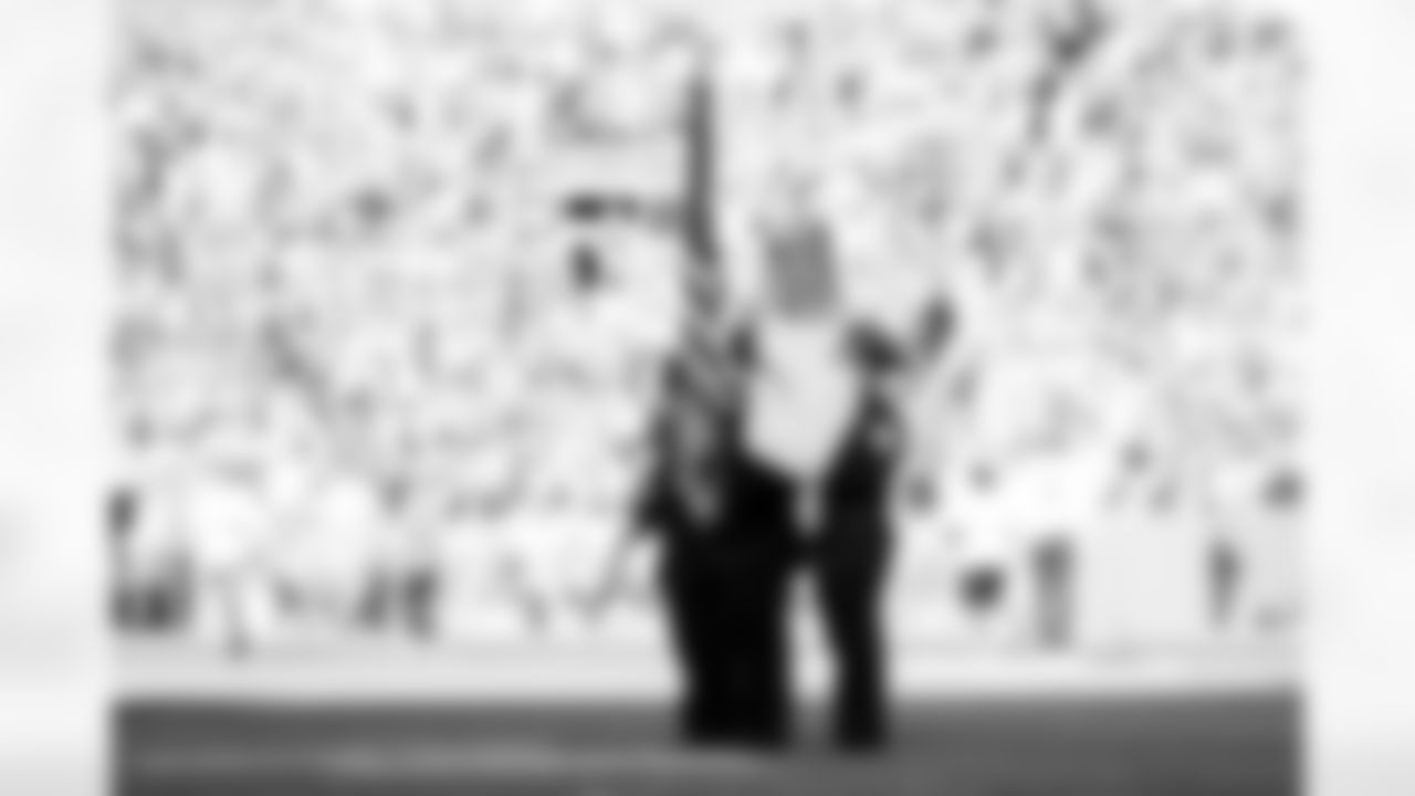 The Color Guard presents the flags before the Broncos' Week 10 game against the Philadelphia Eagles at Empower Field at Mile High in Denver, Colorado on November 14, 2021. (Photo by Ben Swanson)