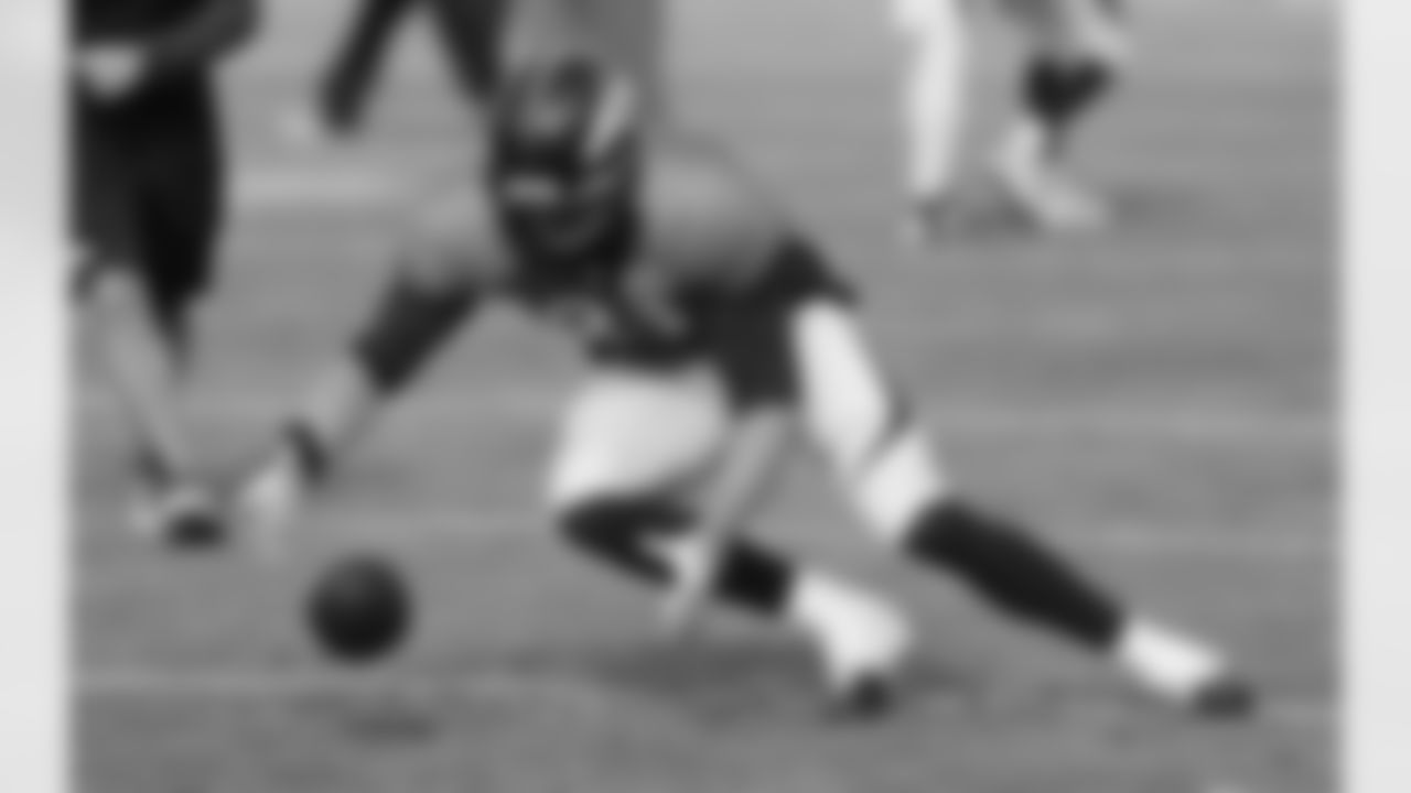 Dreessen practices fumble recoveries.