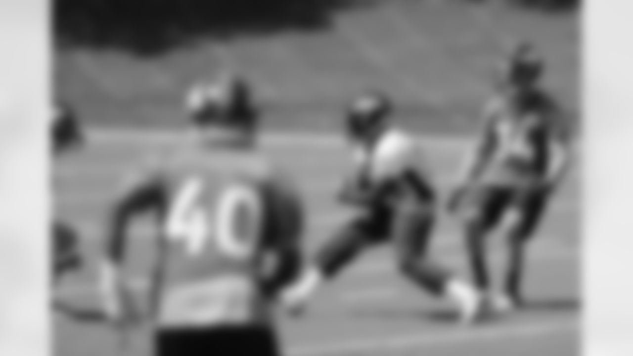 McDuffie makes a catch in the middle of the field.
